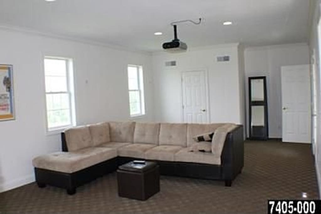 The bedroom you will be renting. It has a queen size bed, sofa and can also have an airbed
