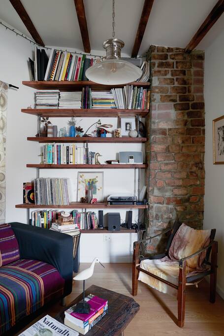 Living room space w/books & records