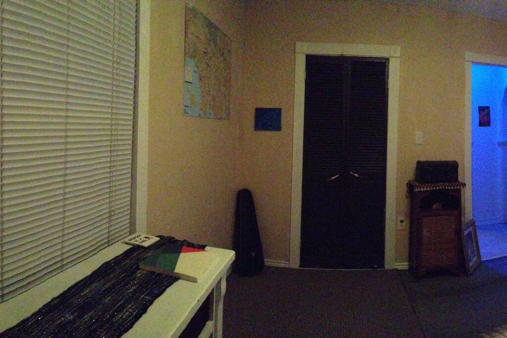 Spacious room with hangers and plenty of storage.