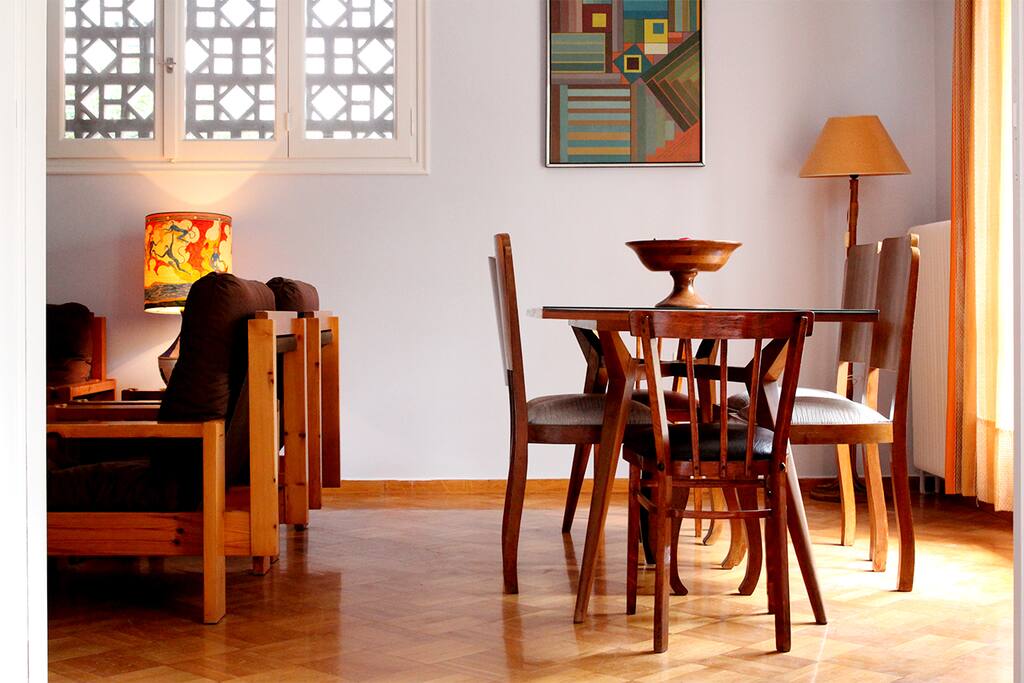 Lounge and dining room with original 1960s furniture and artwork