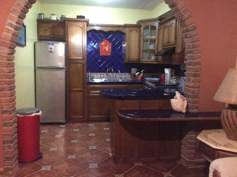 Authentic, yet modern, fully equipped apartment Kitchen. Coffee, flavored creamers, sugar, tea, hot coco, pastries , bottled water, cup-a-soup. Ask about surprise extras.