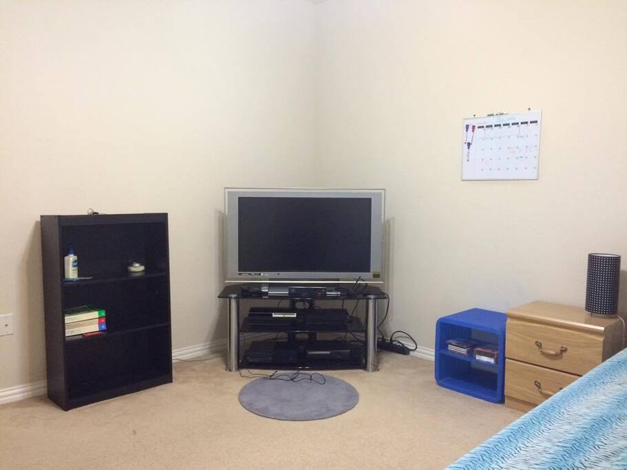 Some more desk space, a shelf, and TV (with entertainment options!).