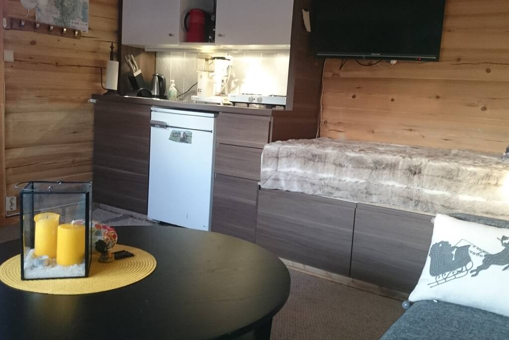 Kitchen area with fridge and springwater