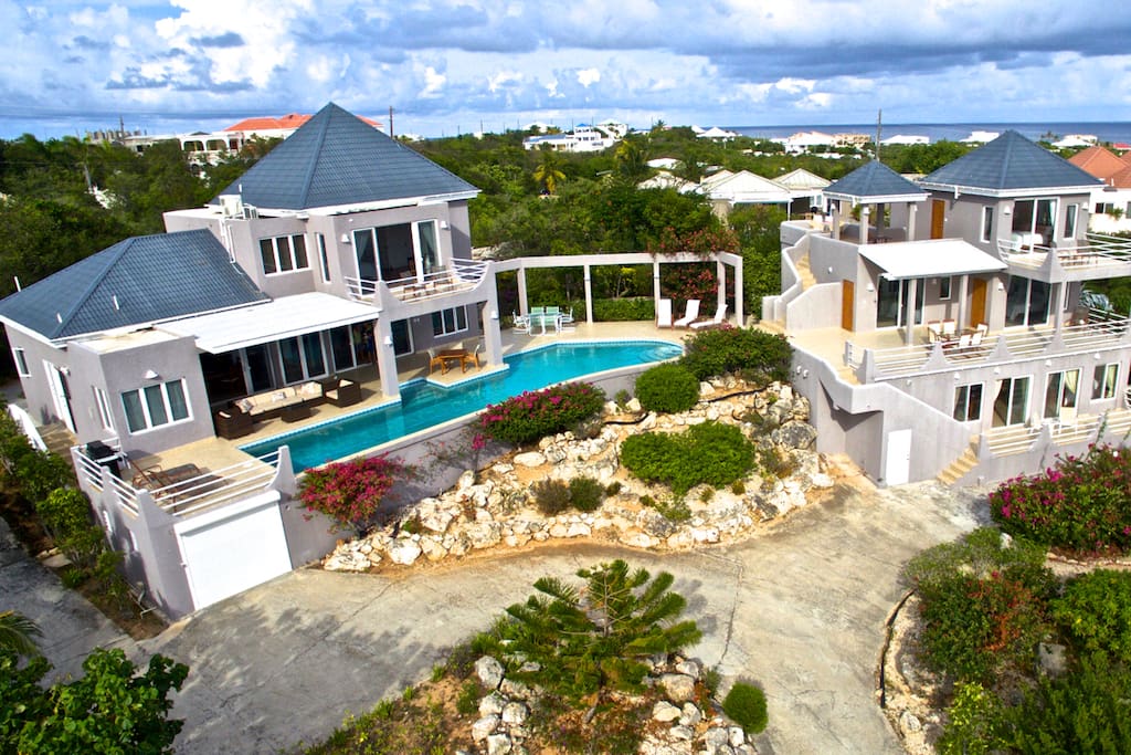 Private and secluded villa comprised of two buildings MAIN Villa and GUEST Villa surrounding a swimming pool