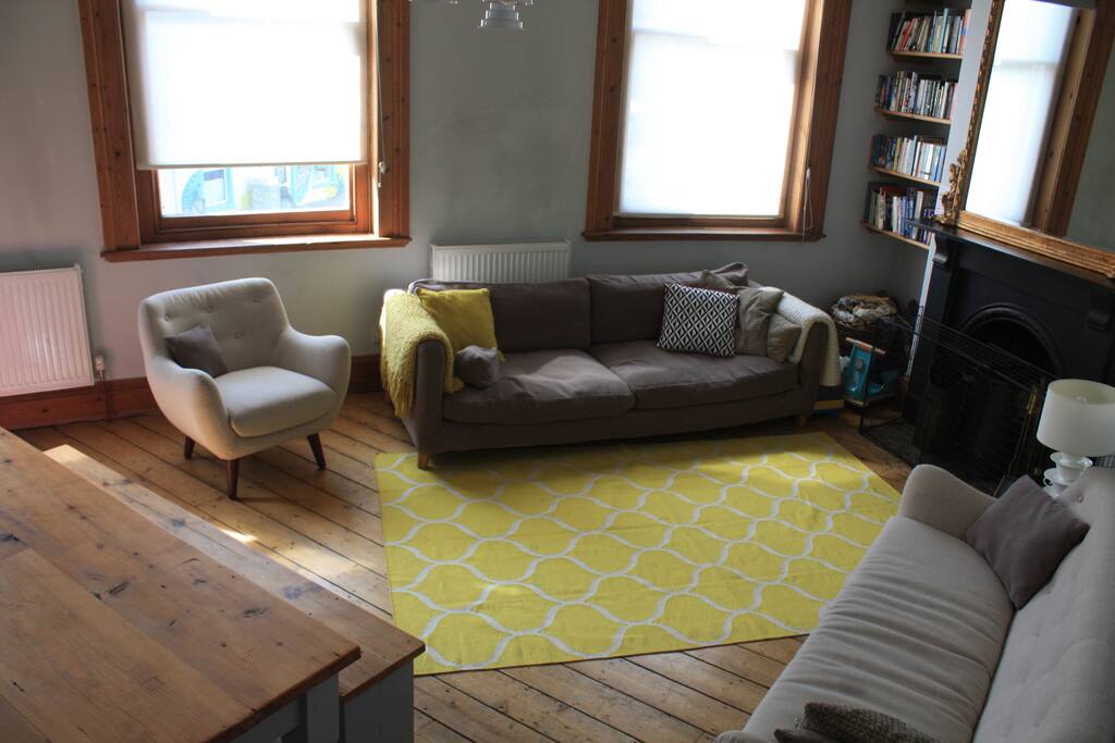 The Living Room - big enough to fit everyone around the TV and Games System (Netflix and Now TV included) and includes a massive dining table to eat and drink.