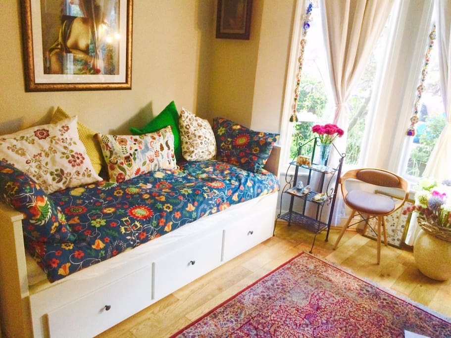 Living room with divan bed configured as a single bed - very comfortable cosy seating