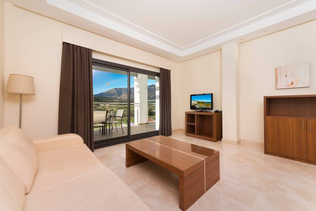 Brightelegant living room with an extra soba bed
