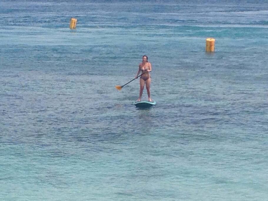 Paddle boarding when the surf is flat and a perfect point break when the surf is up.