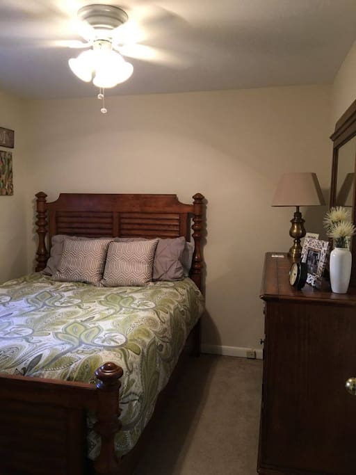 Master suite with a QUEEN bed and ceiling fan