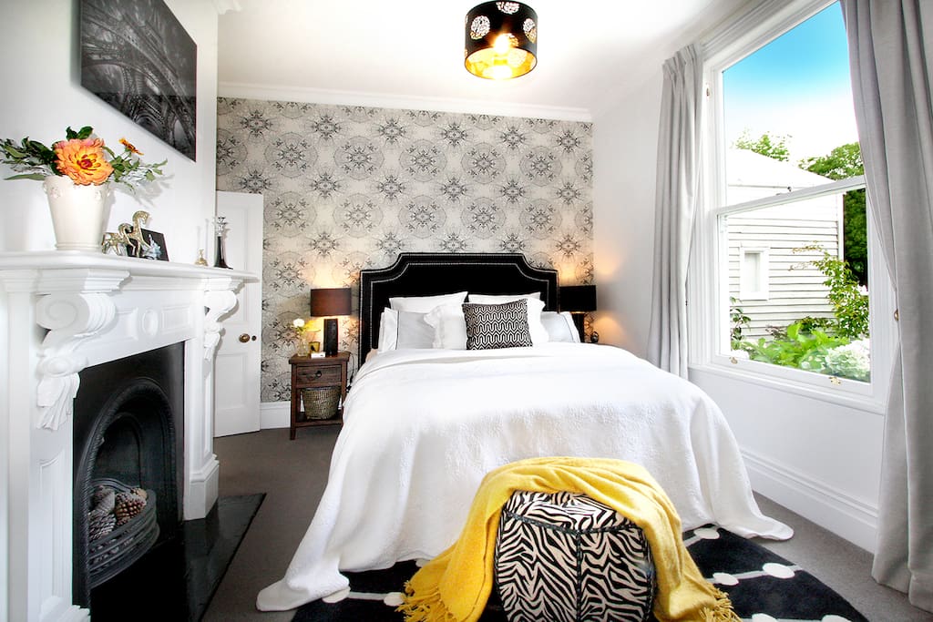 The luxurious master bedroom at Fox's Retreat with queen bed has a private ensuite.