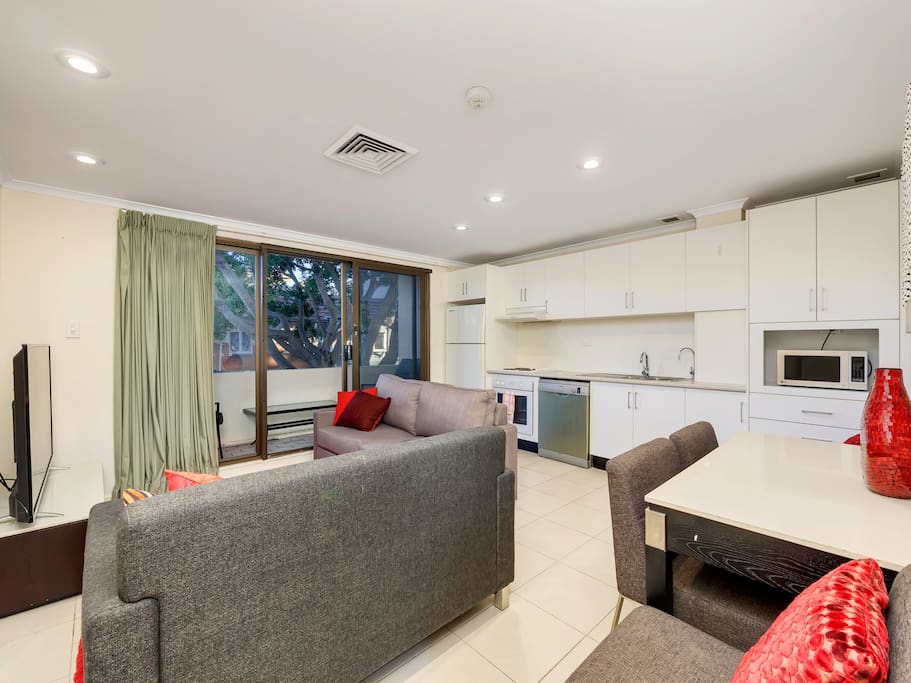 Open Plan Kitchen Dining Lounge with double sofa bed
