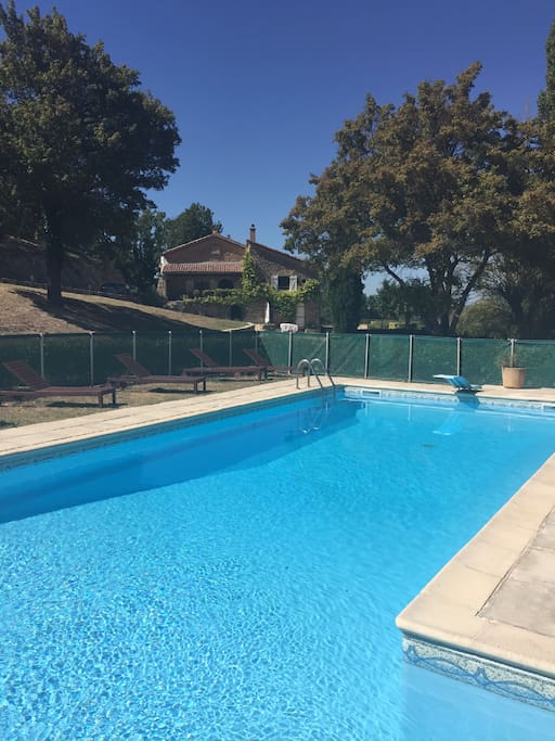 Swimming pool with approved safety fence