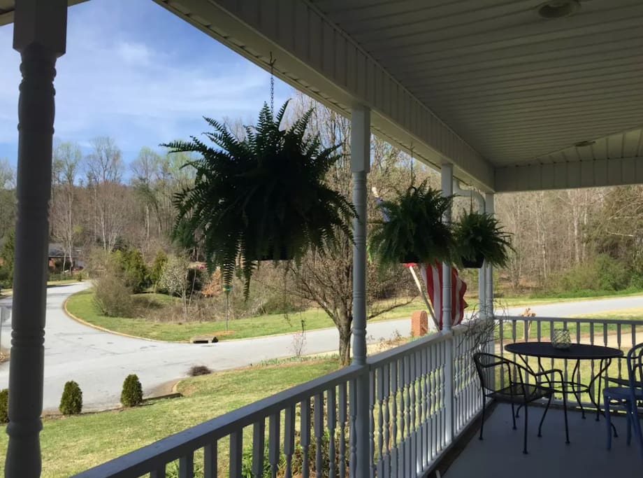 Wrap-around front porch with view of Paris Mountain