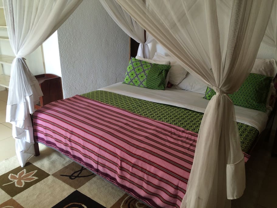 Chambre à coucher confortable et aérée