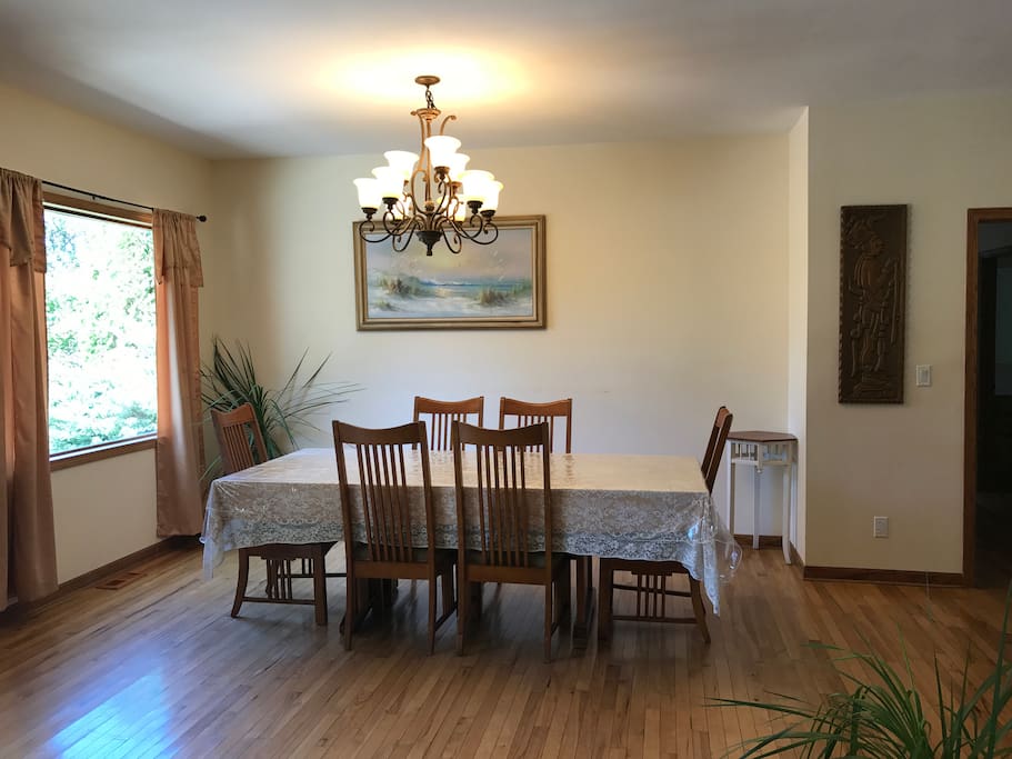 Dining room with many extra chairs for your group.