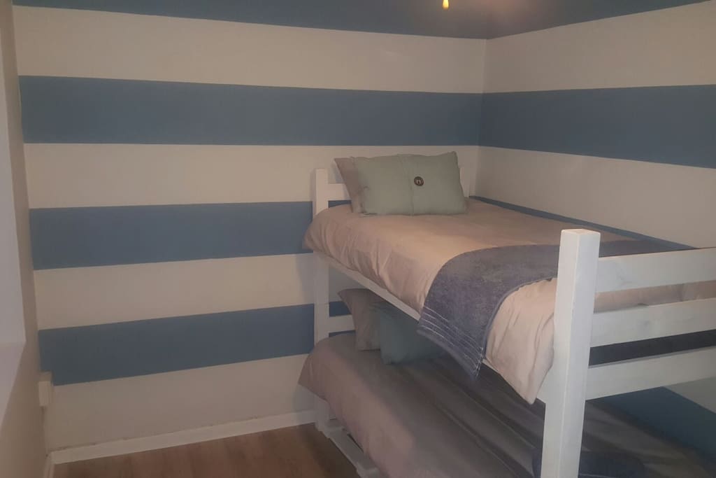 Ocean Room has 2 super comfy bunk beds with percale linen, Towels provided