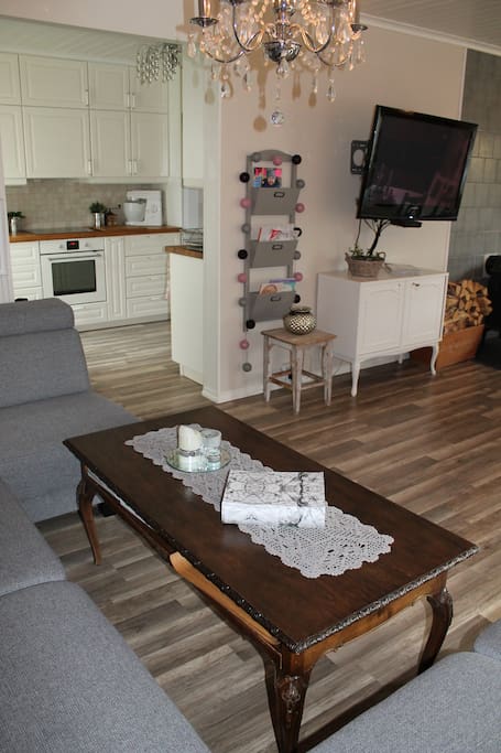 View from sofa in living room / dining room into the kitchen.
