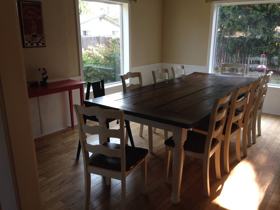 Dinning room table seats 10 comfortably.