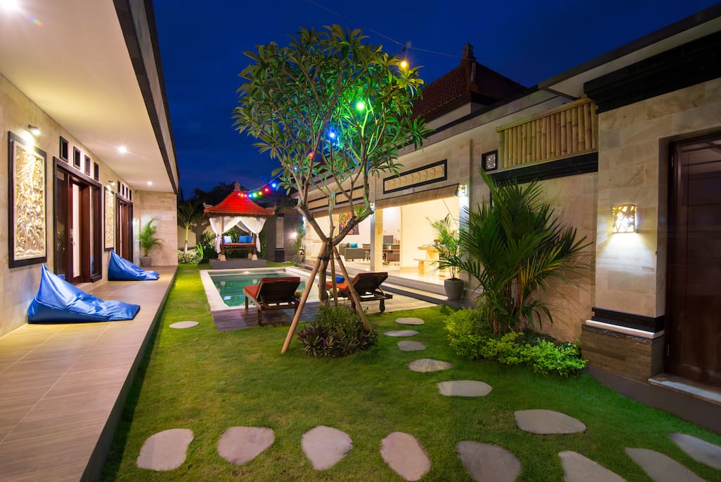 Spacious garden view of kitchen, living-room, gazebo, pool and rooms