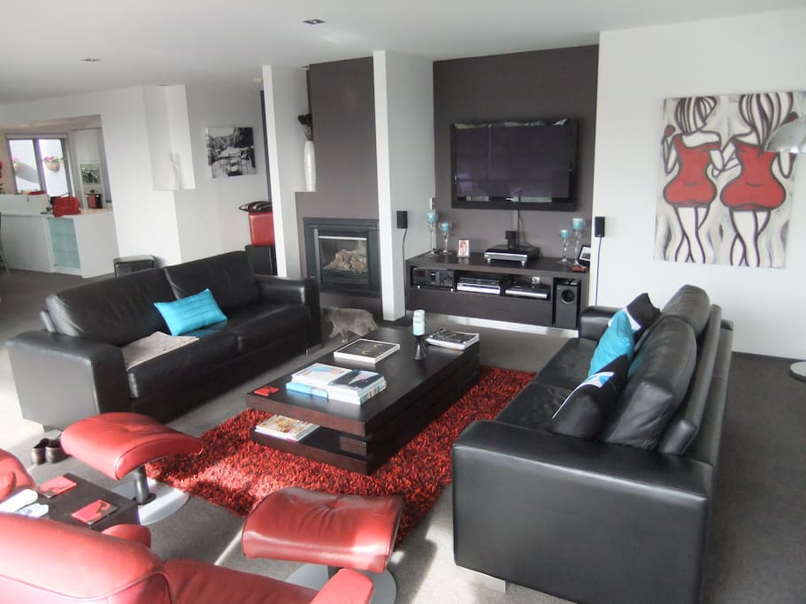 Large comfortable open plan lounge living dining room.