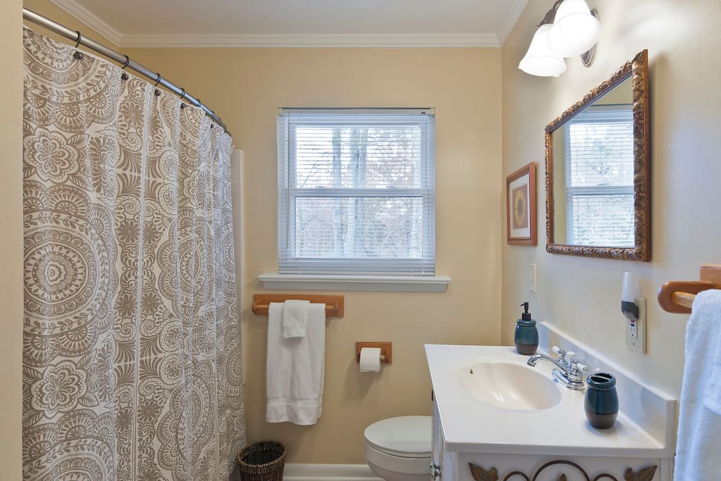 Private, Non-Shared Bath Across the Hall with Tub and Shower. Unlimited Hot Water. Includes Towels, Washcloths and Toiletries.