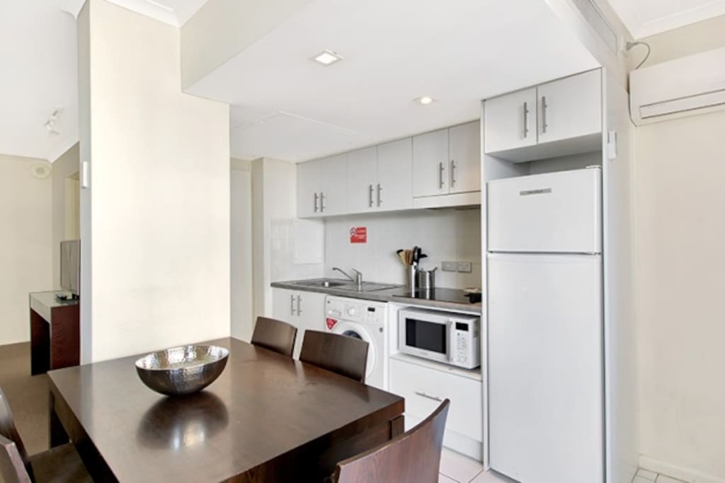 Equipped kitchen. There is also a washing machine in the kitchen. Communal dryers are located on the lower floors for all guest to use.