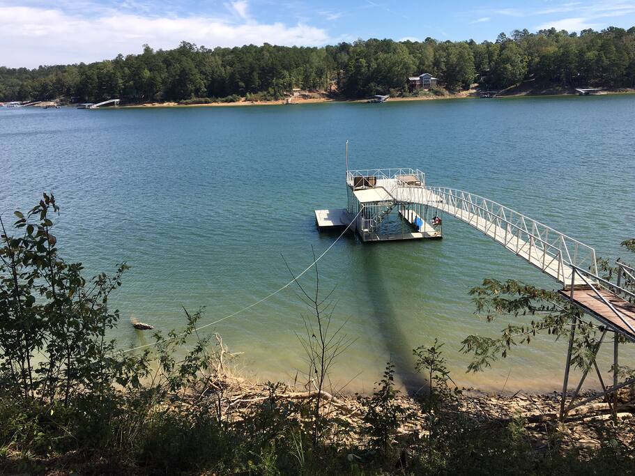 Over 200 feet of lake front with sun deck and swim pier
