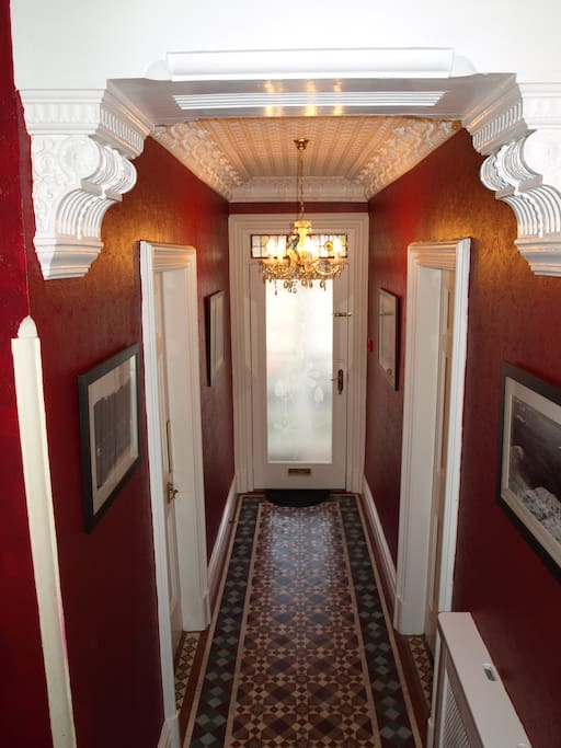 The entrance hallway retains many of its original features.