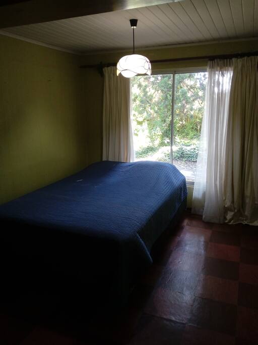 Habitación con vista al jardin