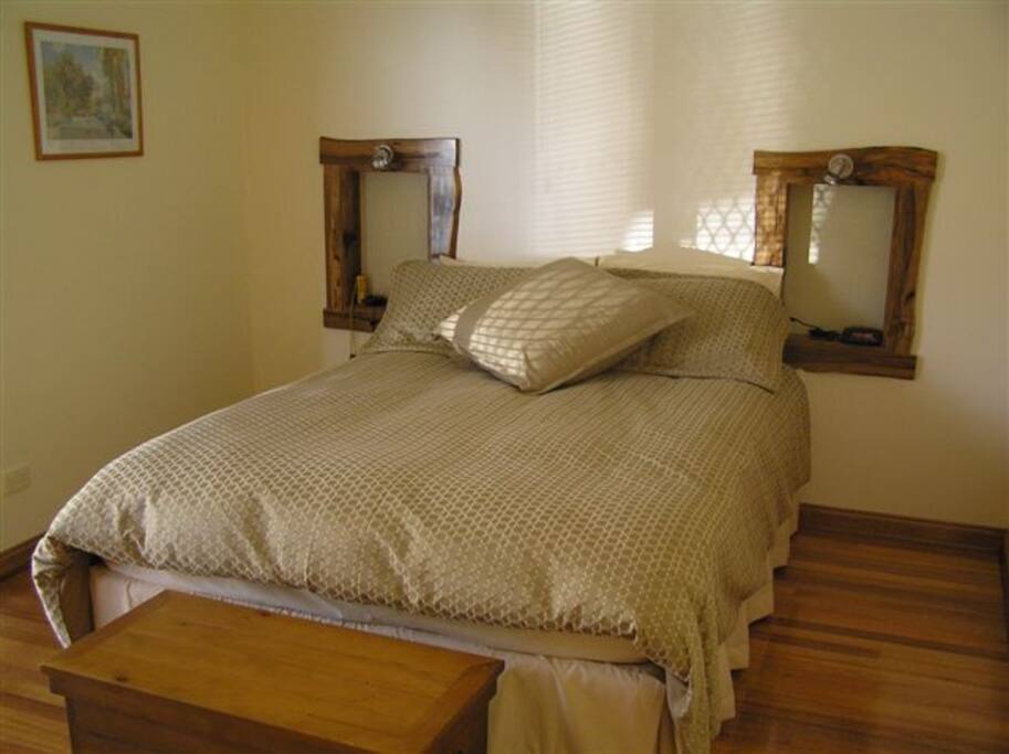 Main bedroom with queen size bed.