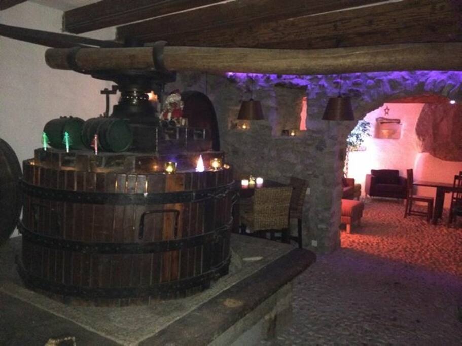 Wine cave with original wine press, first floor