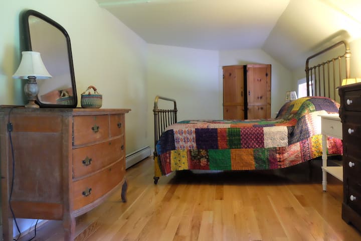 Master bedroom with full size mattress