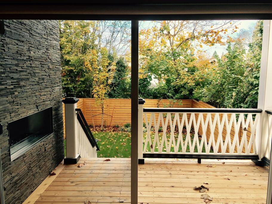 Back yard, porch, and outdoor fireplace