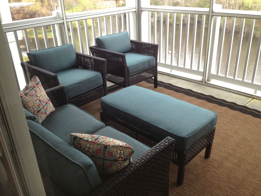 screened porch overlooking the pond