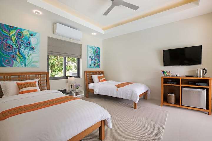 Habitación doble con dos dormitorios.