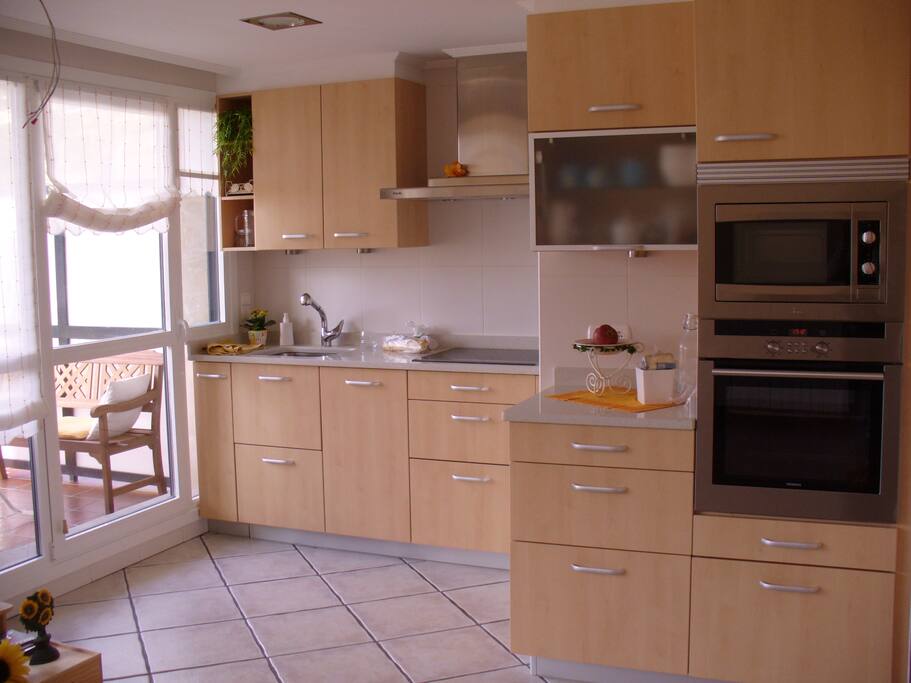 Kitchen with sea view connected with salon and big terrace