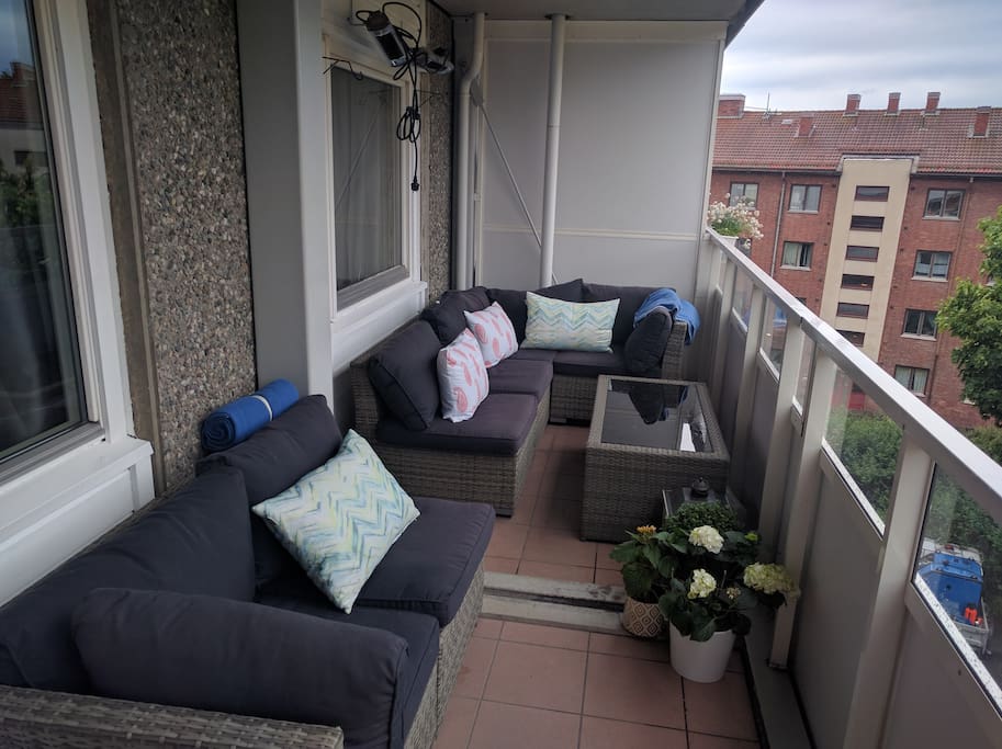 Large balcony with seating for 6 people