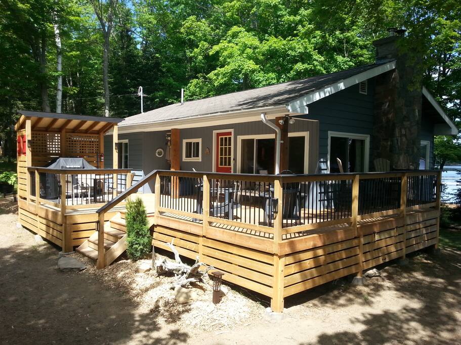 Cottage on a point. Sand beach with Sun all day! Yes its true!! With a one of a kind beach point you can get sun all day ! Point goes south from the cottage allowing east west and south exposure!