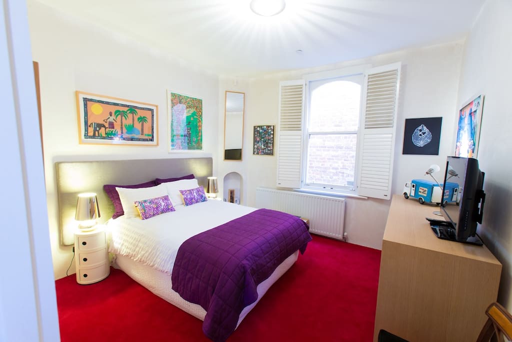 Queen size bed, luxurious cotton linen, duvet & electric blanket, hydronic heating, TV/DVD player, full length mirror and cupboard space. The bathroom is adjacent to this bedroom.