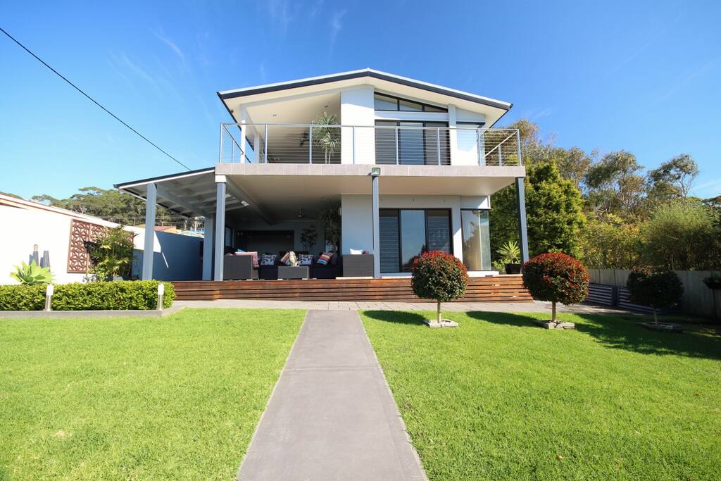 Let the kids play in the beautiful, manicured and fully-fenced yard.