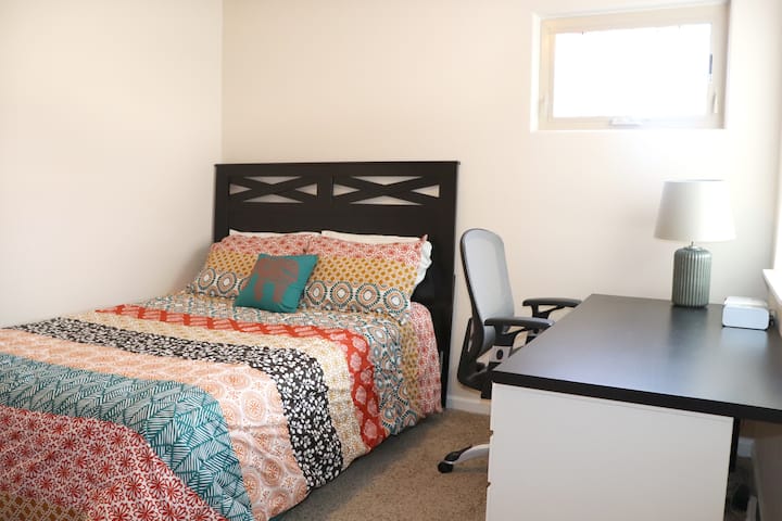 Guest Room 1 with Desk and Queen Bed