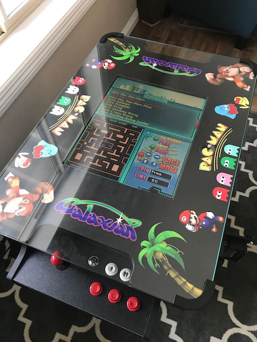 Upstairs: PacMan 412 game arcade table