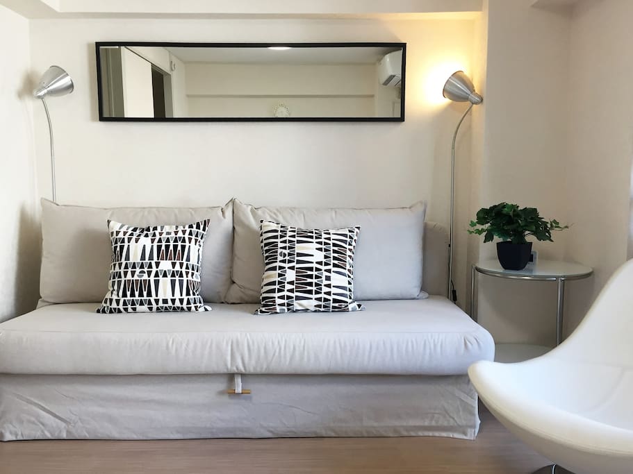 Sofa(bed) and chair in lounge area