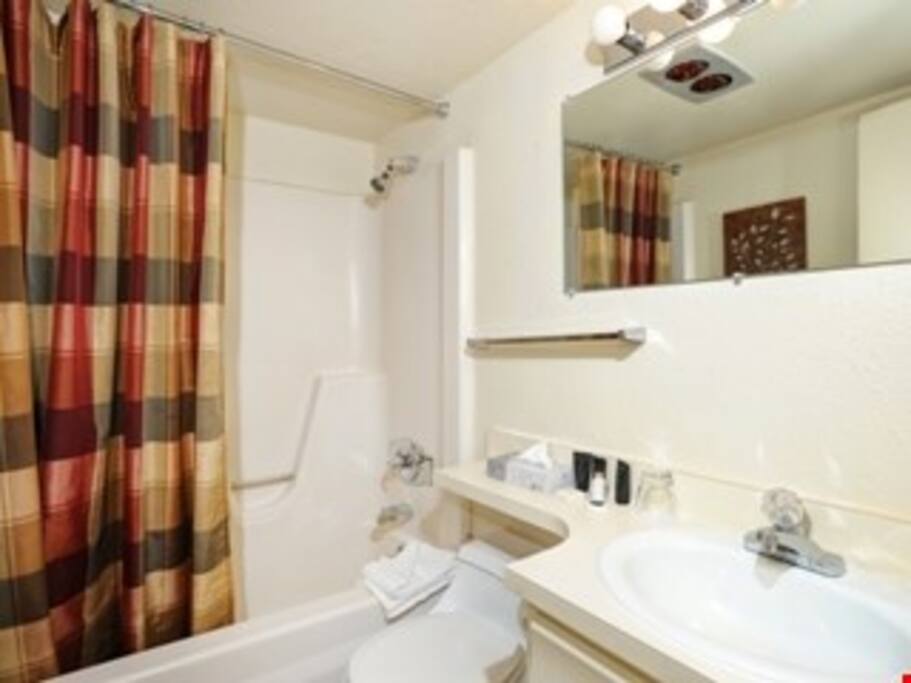 Prepare for a day outside in the bright bathroom
