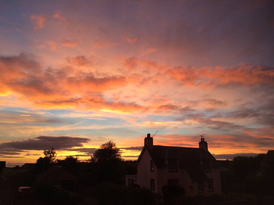 Reflections of the sunset on Victoria Road