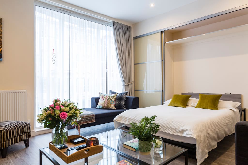 2nd bed is a full size Murphy wall bed that stows away quickly and easily