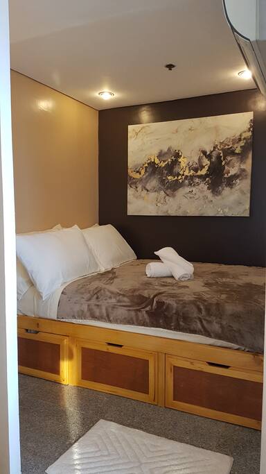 Cozy bed with 4 pillows, blanket and duvet (in storage) for a refreshing rest