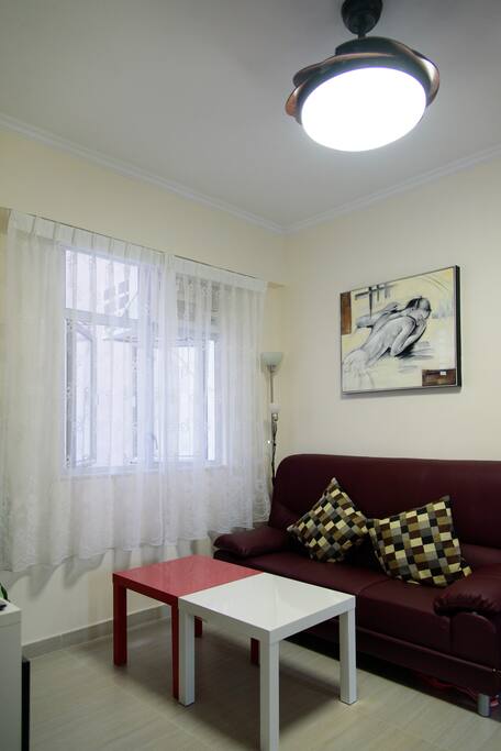Living room with light + fan.