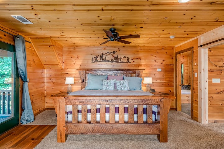 Catch up on your sleep in the  cozy master bedroom.