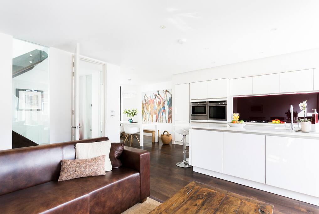 View to Kitchen Island and Dining Area on First floor